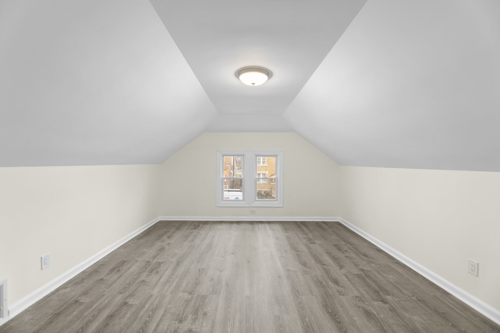 8946 South May Street Chicago, IL 60620 - Photo 9 of 23 an empty room with wooden floor and windows