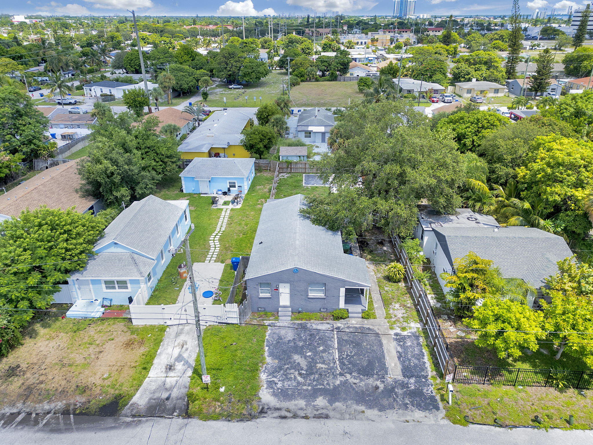 172 West 15th Street, Unit 1 Riviera Beach, FL 33404 - Photo 1 of 23 an aerial view of a house with a garden and plants
