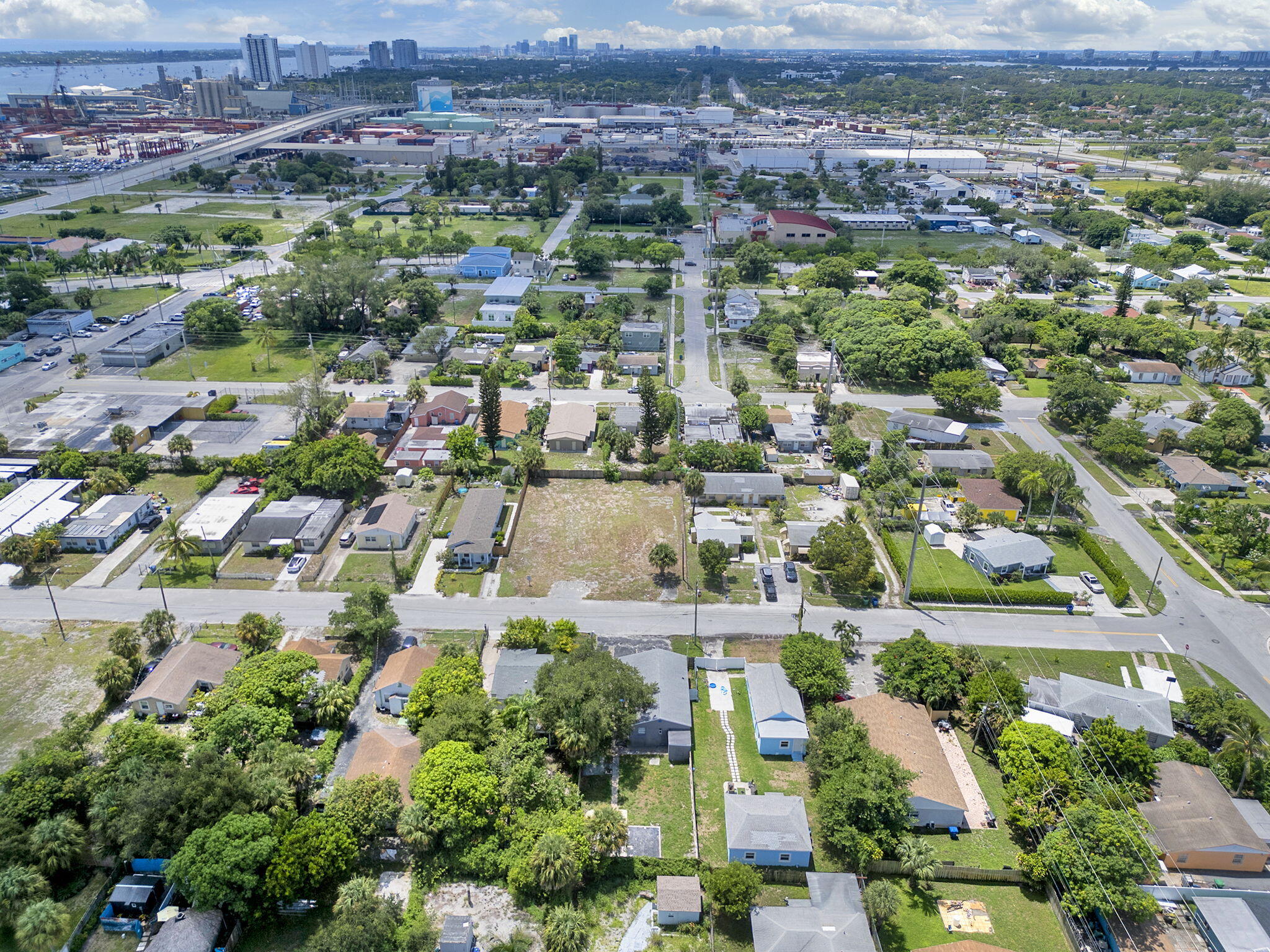 172 West 15th Street, Unit 1 Riviera Beach, FL 33404 - Photo 18 of 23 an aerial view of residential houses with outdoor space