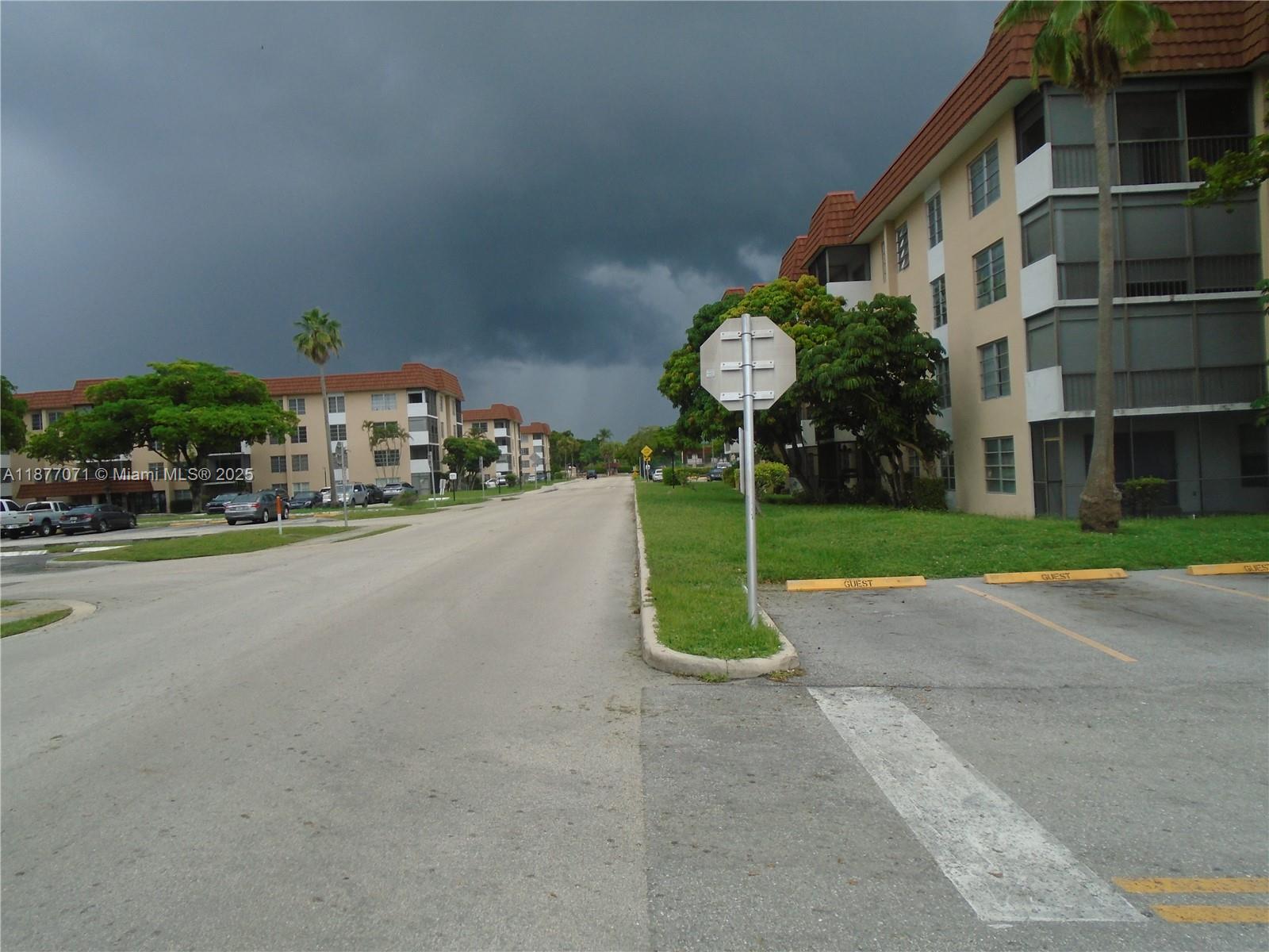 4174 Inverrary Drive, Unit 303 Lauderhill, FL 33319 - Photo 3 of 27 a view of a house with a yard and table