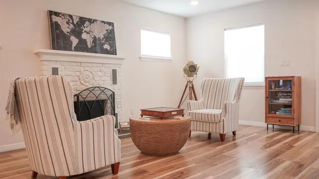 a view of hall way with furniture and entryway
