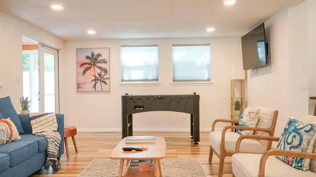 a kitchen with stainless steel appliances a stove a sink a refrigerator and cabinets