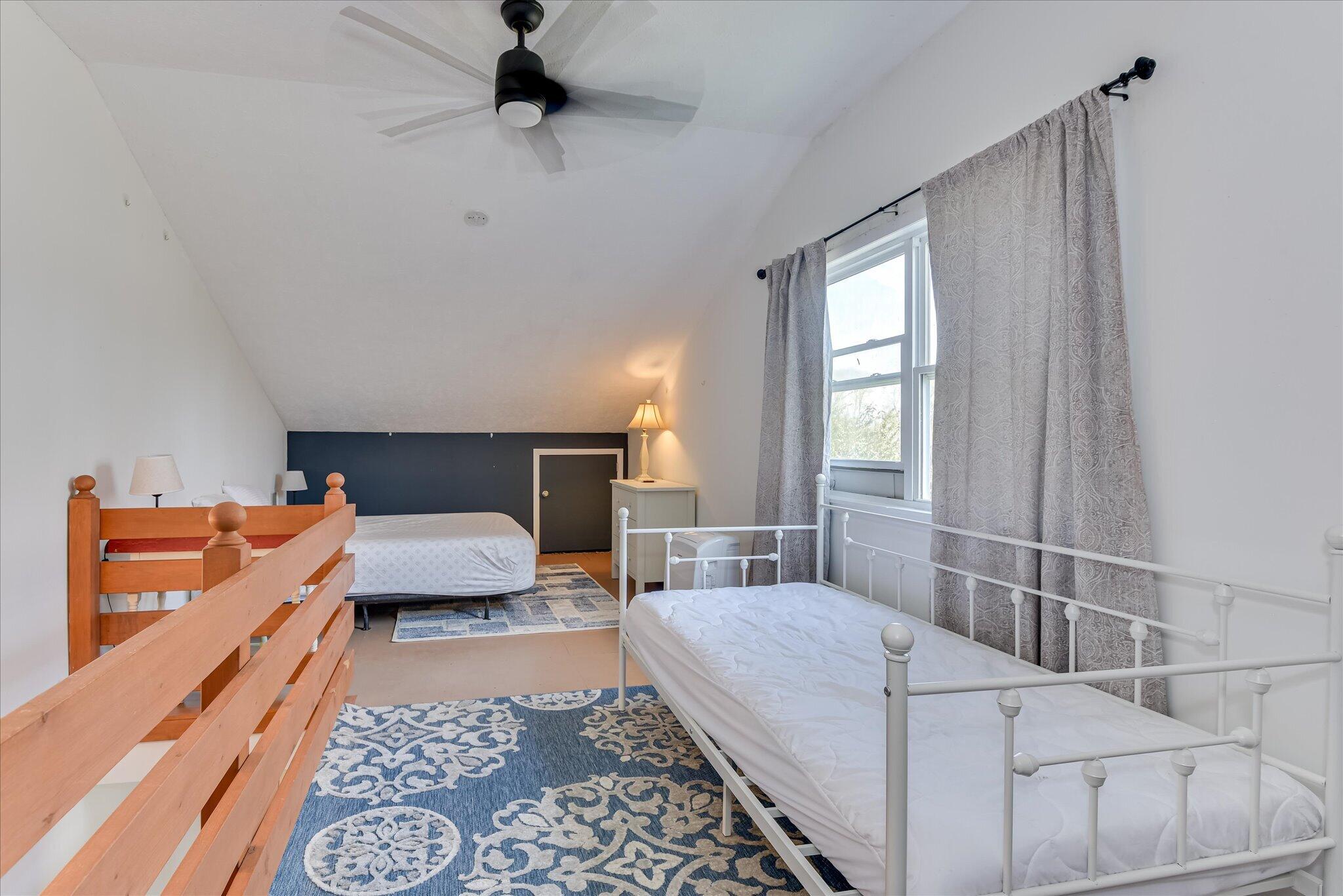 1063 Colbert Bridge Road Aiken, SC 29803 - Photo 46 of 68 a bedroom with a bed and window