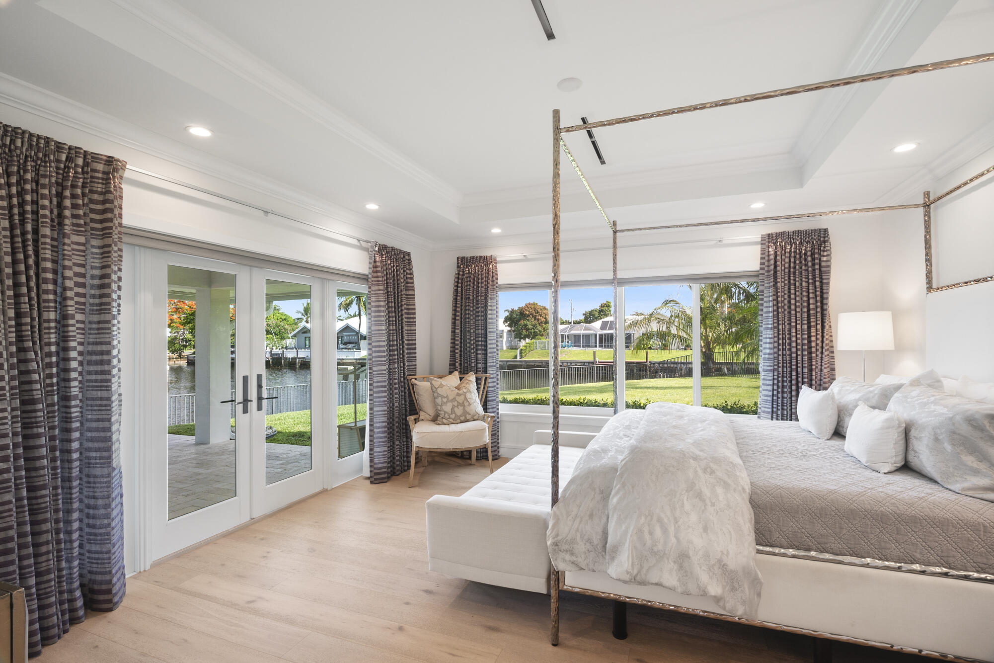 943 Pepperridge Terrace Boca Raton, FL 33486 - Photo 23 of 85 Primary Bedroom w/ Water & Yard Views