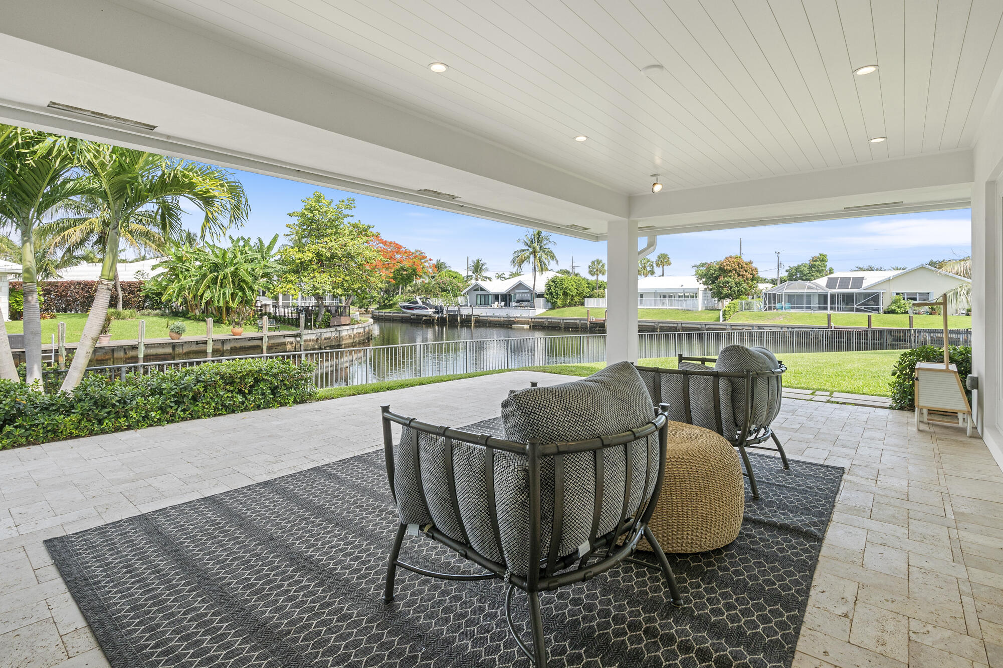 943 Pepperridge Terrace Boca Raton, FL 33486 - Photo 31 of 85 Covered Patio from Primary & Family Rm