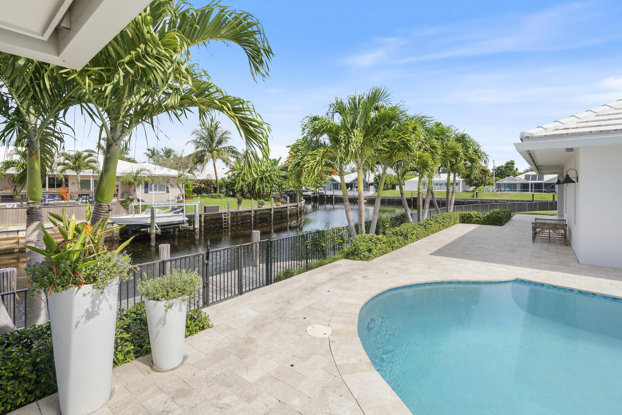 943 Pepperridge Terrace Boca Raton, FL 33486 - Photo 56 of 85 Pool Patio Leads to Dock