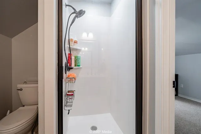 a view of parking garage with cars