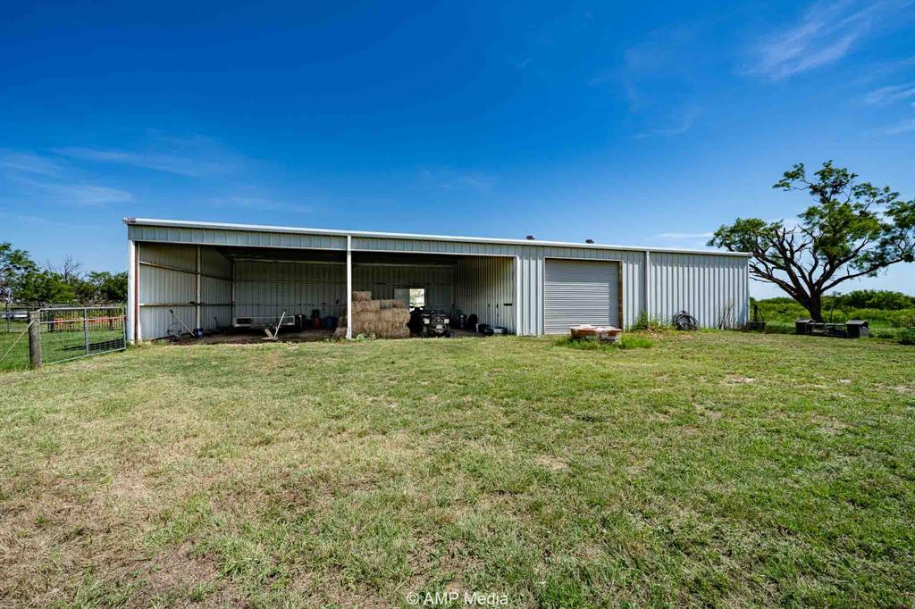 1869 Farm To Market Road 605 Hawley, TX 79525 - Photo 31 of 39 a front view of house with a garden