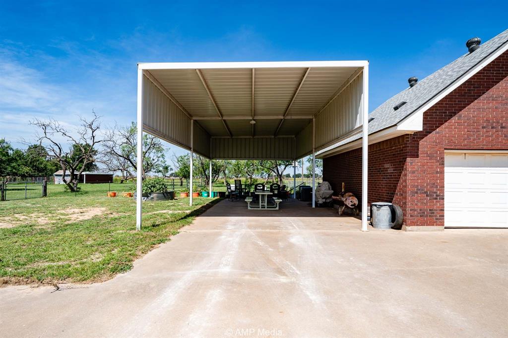 1869 Farm To Market Road 605 Hawley, TX 79525 - Photo 39 of 39 a view of a house with backyard and porch