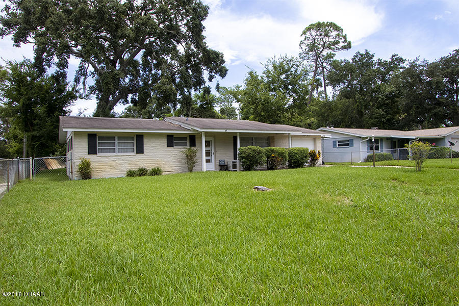 1011 Cherokee Ranch Road Holly Hill, FL 32117 - Photo 4 of 26 1011-Cherokee-Ranch-Exterior-Front-Web_0