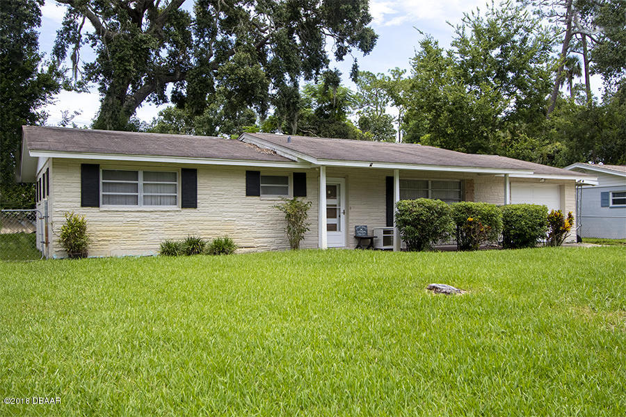 1011 Cherokee Ranch Road Holly Hill, FL 32117 - Photo 6 of 26 1011-Cherokee-Ranch-Exterior-Front-Web_0
