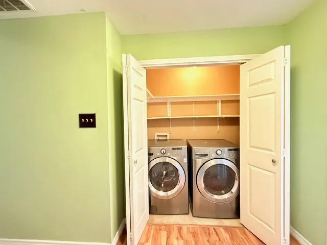a view of a kitchen with washer and dryer