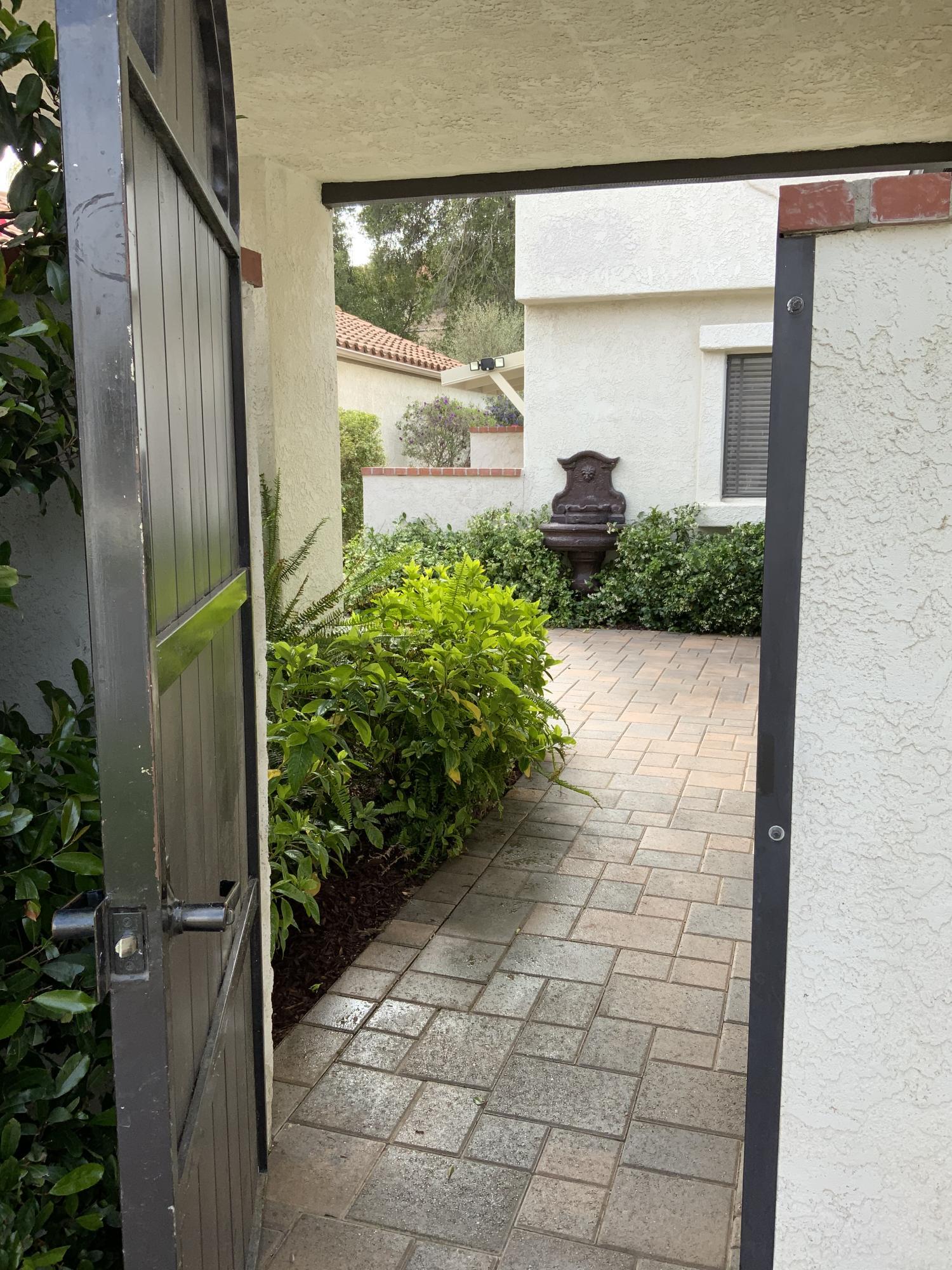 869 Congressional Road Simi Valley, CA 93065 - Photo 31 of 38 a front view of a house with a yard