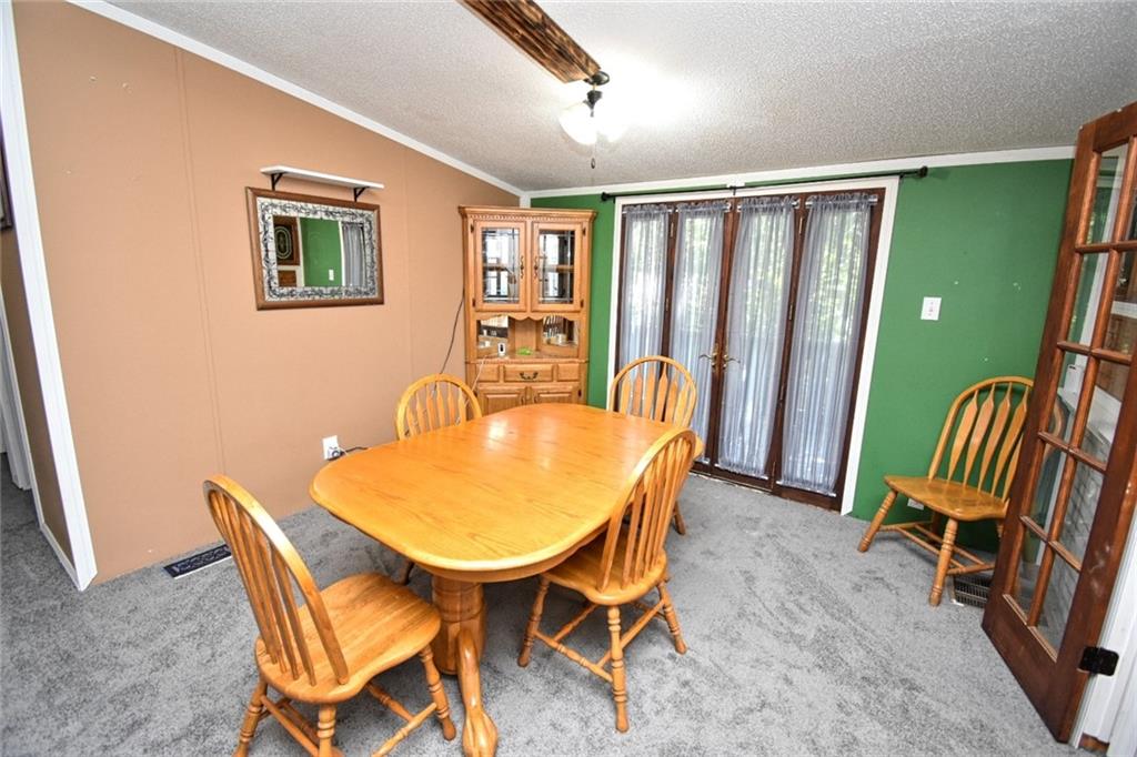 1041 Barr Run Road Marianna, PA 15345 - Photo 20 of 32 a view of a dining room with furniture and a window
