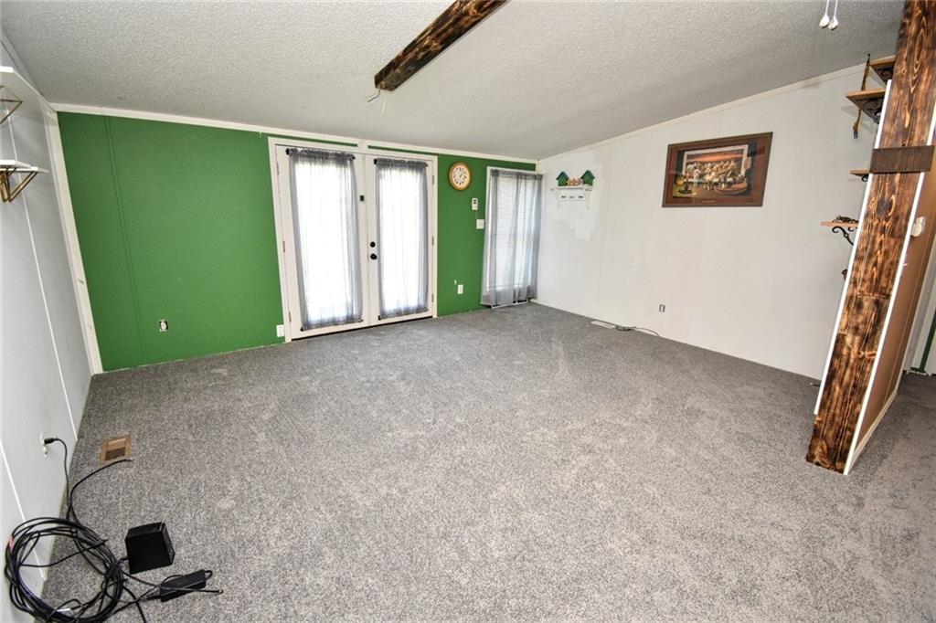 1041 Barr Run Road Marianna, PA 15345 - Photo 21 of 32 a view of a room with gym equipment and windows