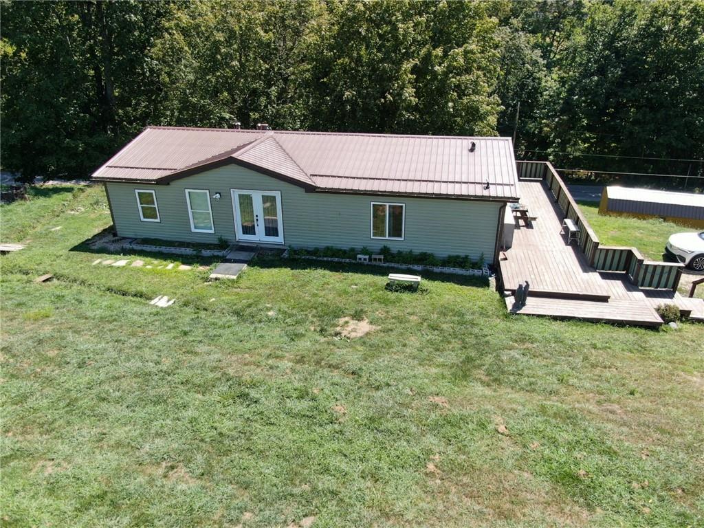 1041 Barr Run Road Marianna, PA 15345 - Photo 3 of 32 a house with trees in the background
