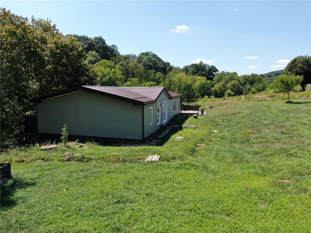 1041 Barr Run Road Marianna, PA 15345 - Photo 4 of 32 a backyard of a house with lots of green space