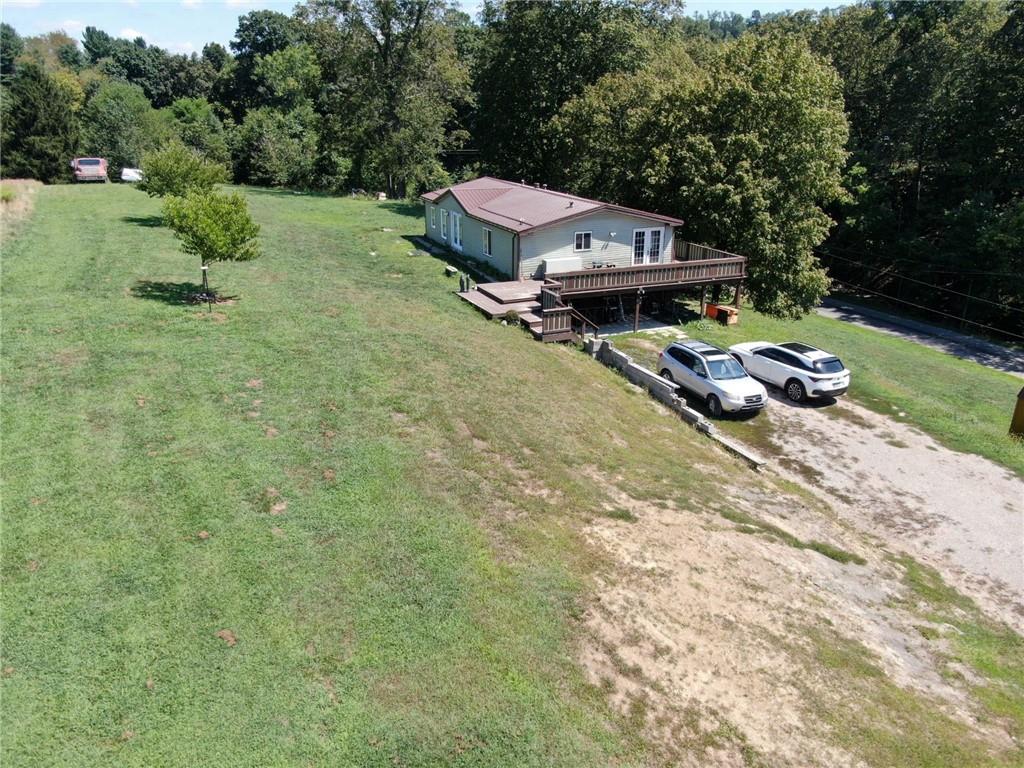 1041 Barr Run Road Marianna, PA 15345 - Photo 5 of 32 a swimming pool with outdoor seating and yard