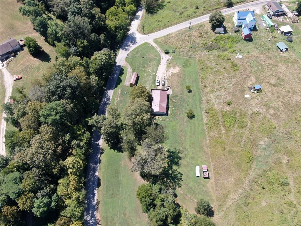 1041 Barr Run Road Marianna, PA 15345 - Photo 10 of 32 an aerial view of a house with a yard and large trees