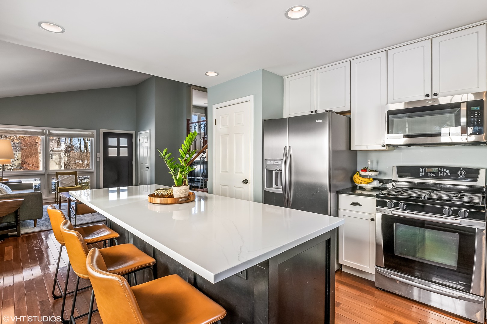 637 Second Avenue Libertyville, IL 60048 - Photo 9 of 22 a kitchen with stainless steel appliances a stove a sink a microwave a refrigerator and cabinets