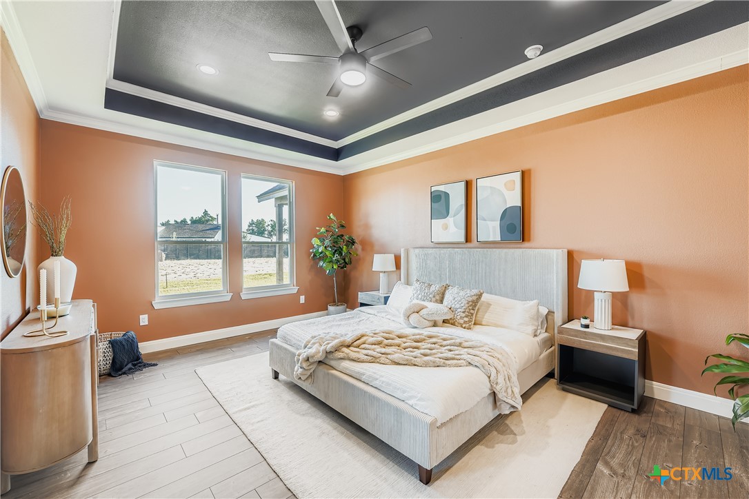 222 Arosa Drive Elgin, TX 78621 - Photo 2 of 40 a spacious bedroom with a large bed and a window