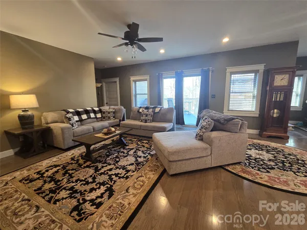 a fireplace with a clock on wall