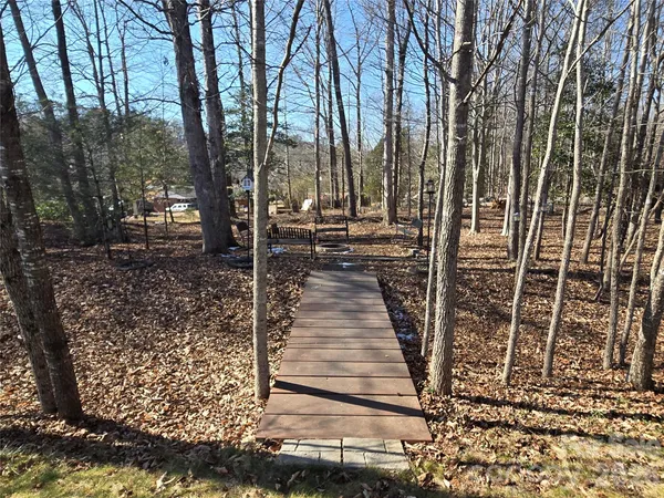 a view of a pathway with a yard
