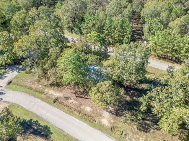 an aerial view of residential house with outdoor space