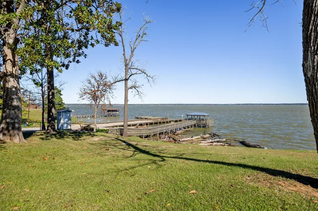 a view of a swimming pool with a lounge chair