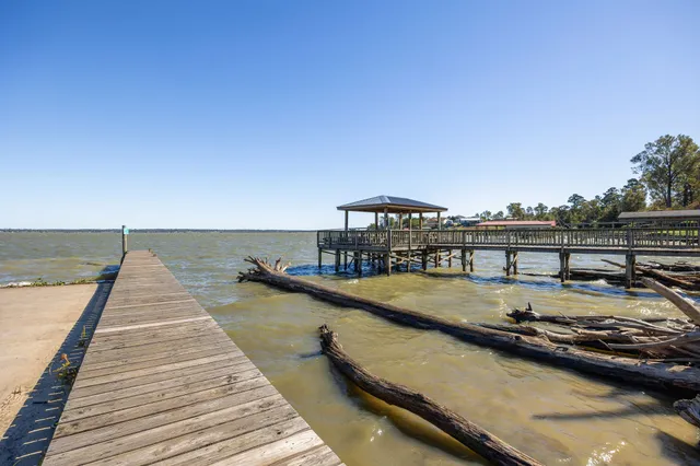 an aerial view of a swimming pool and mountain view