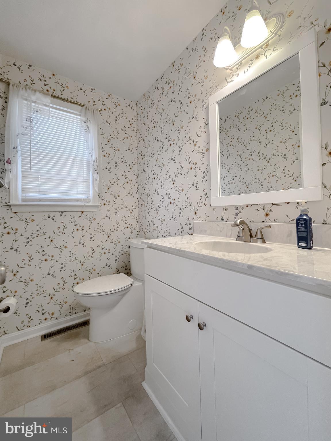 513 Clarks Run Road La Plata, MD 20646 - Photo 16 of 45 a bathroom with a toilet sink and mirror