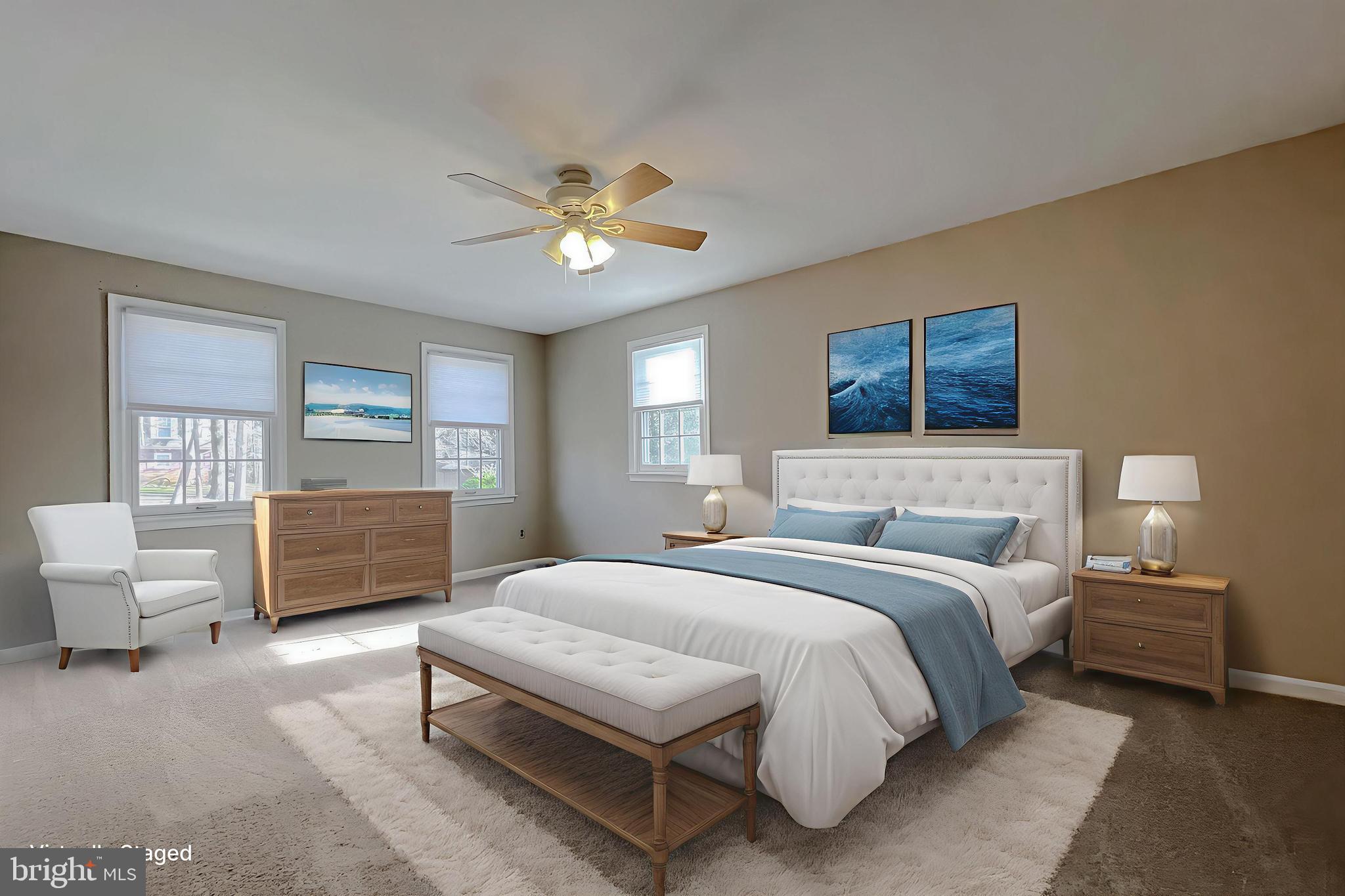 513 Clarks Run Road La Plata, MD 20646 - Photo 20 of 45 a bedroom with a large bed and a chandelier