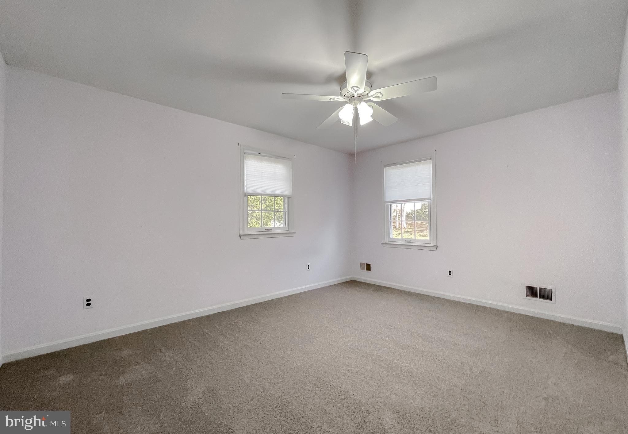 513 Clarks Run Road La Plata, MD 20646 - Photo 28 of 45 an empty room with a window and a fan