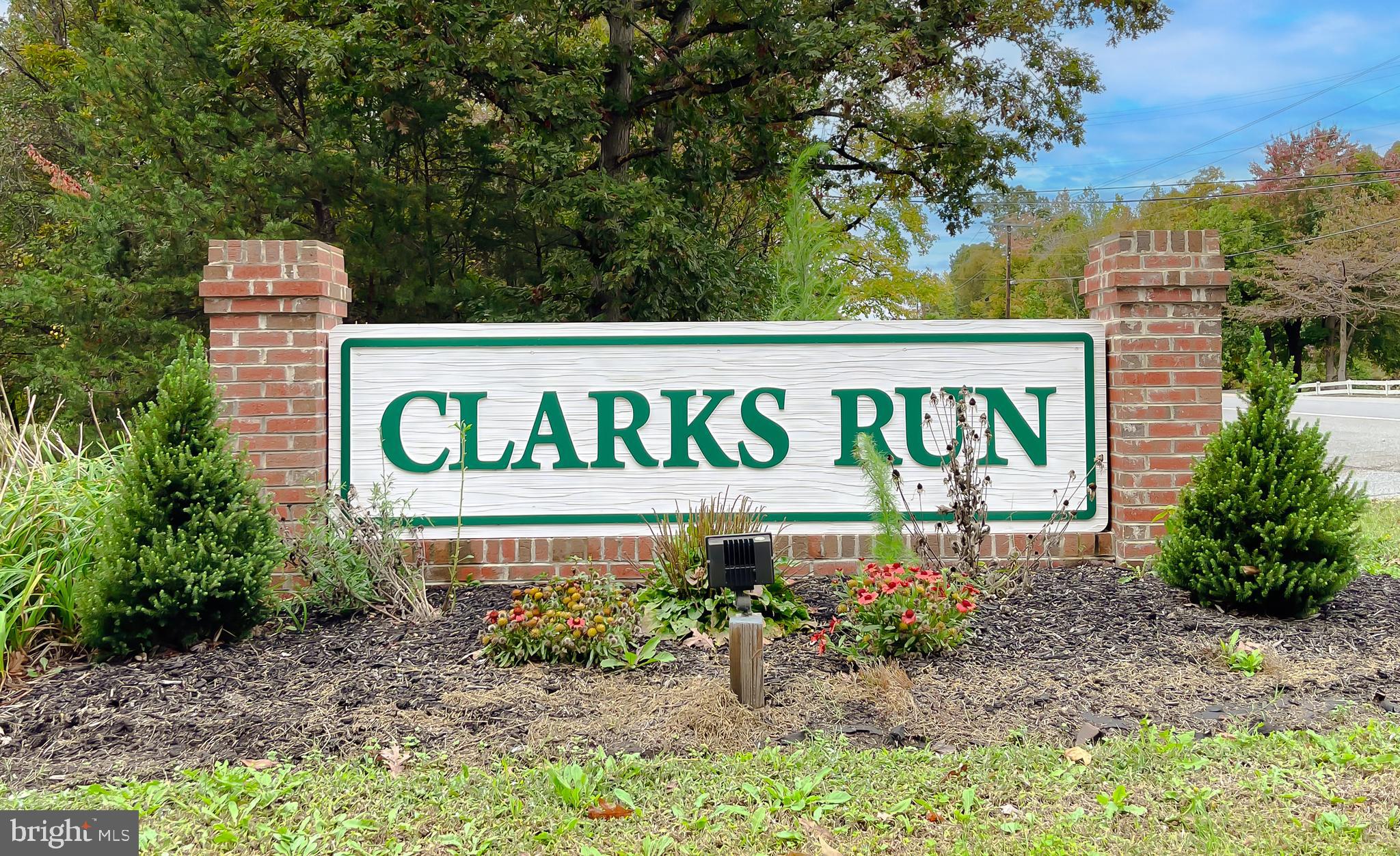 513 Clarks Run Road La Plata, MD 20646 - Photo 43 of 45 a sign that is on a brick wall