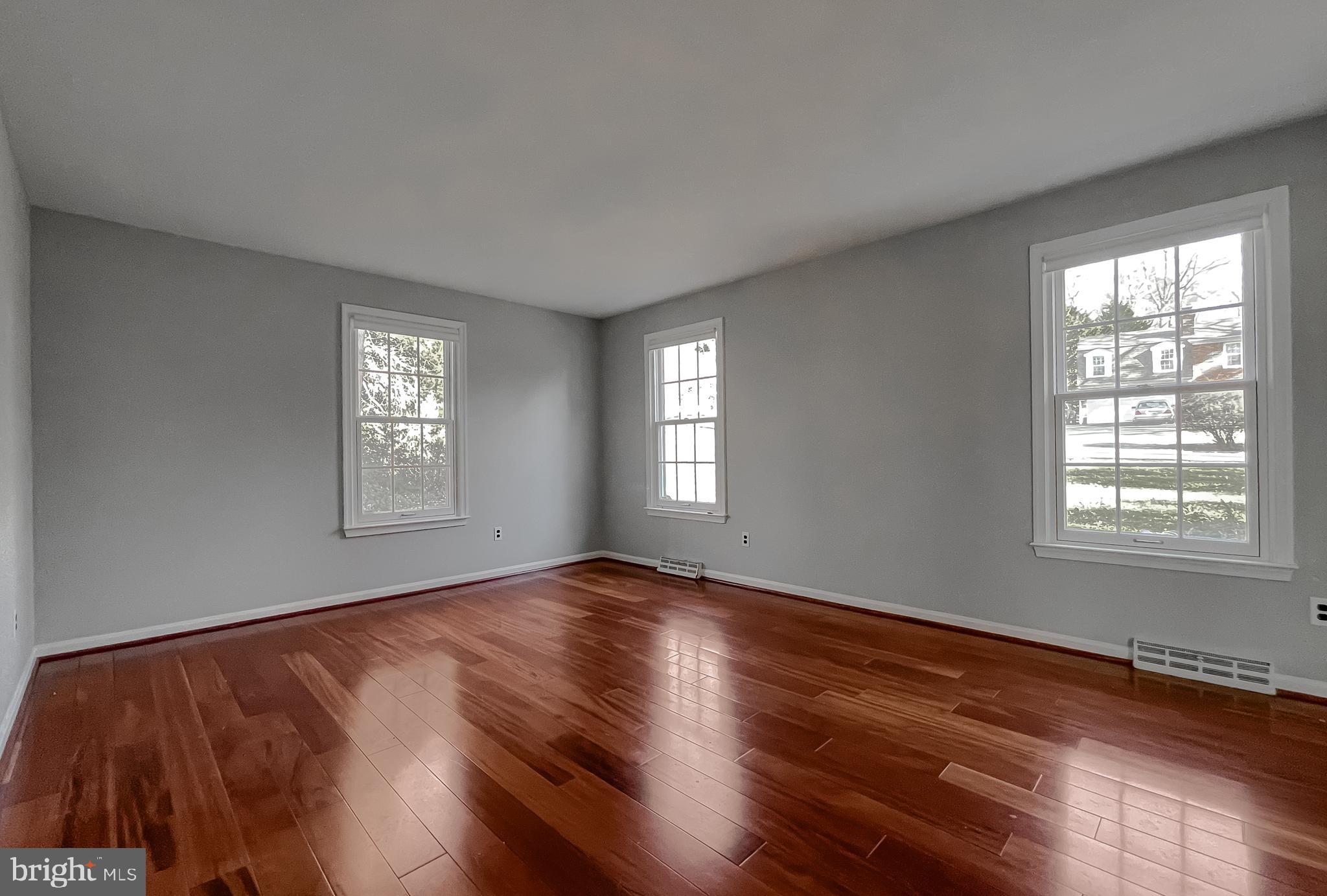 513 Clarks Run Road La Plata, MD 20646 - Photo 5 of 45 a view of an empty room with wooden floor and a window