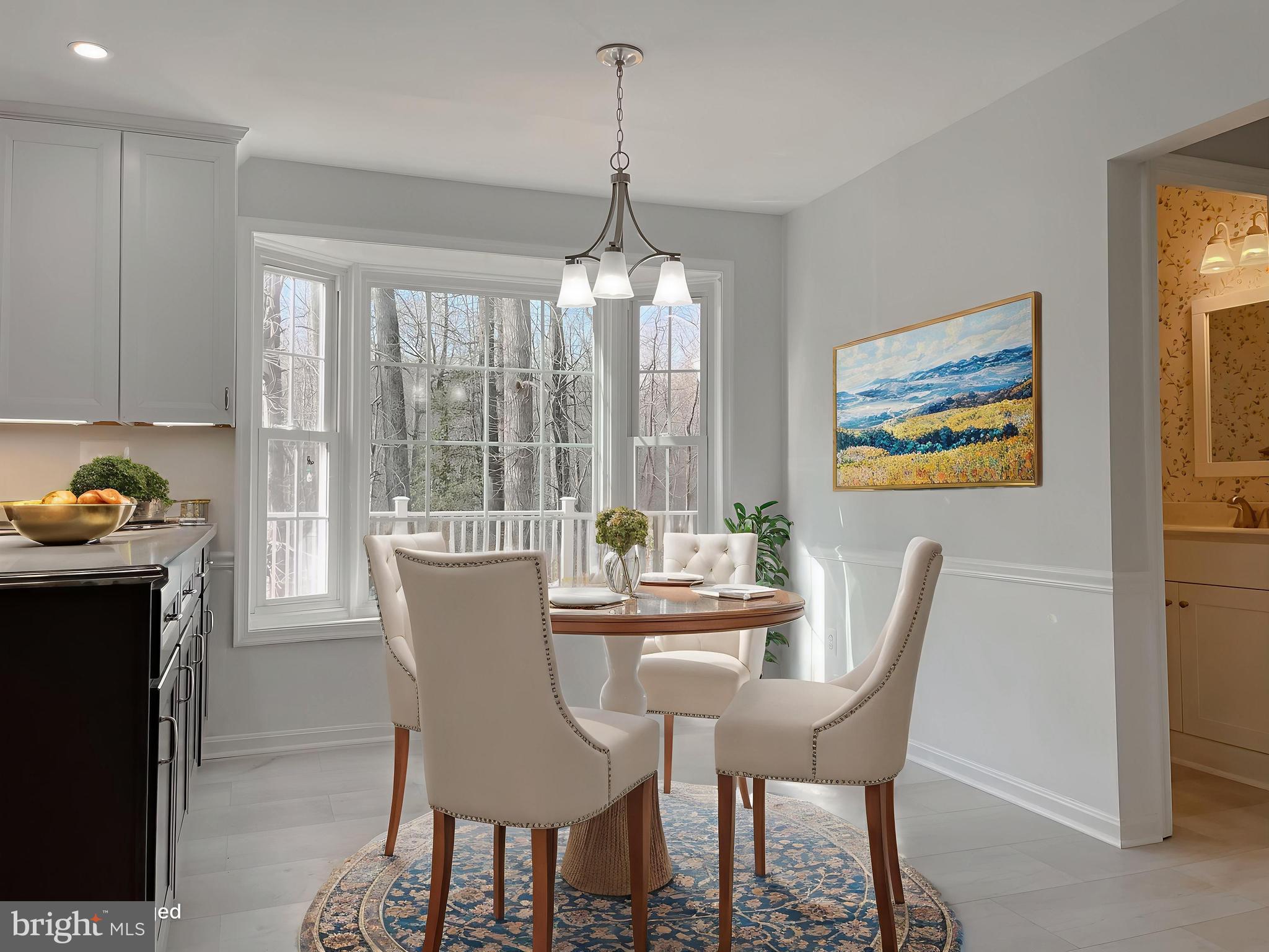 513 Clarks Run Road La Plata, MD 20646 - Photo 10 of 45 a dining room with furniture a chandelier and wooden floor