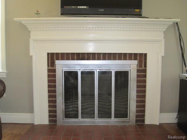 504 Maple Street Howell, MI 48843 - Photo 33 of 52 Living Room Fireplace.jpg