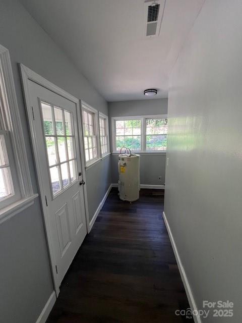 306 White Store Road Wadesboro, NC 28170 - Photo 20 of 24 a view of an empty room with wooden floor and a window