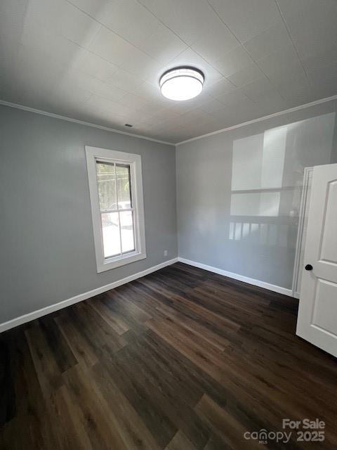 306 White Store Road Wadesboro, NC 28170 - Photo 6 of 24 a view of an empty room with wooden floor and a window