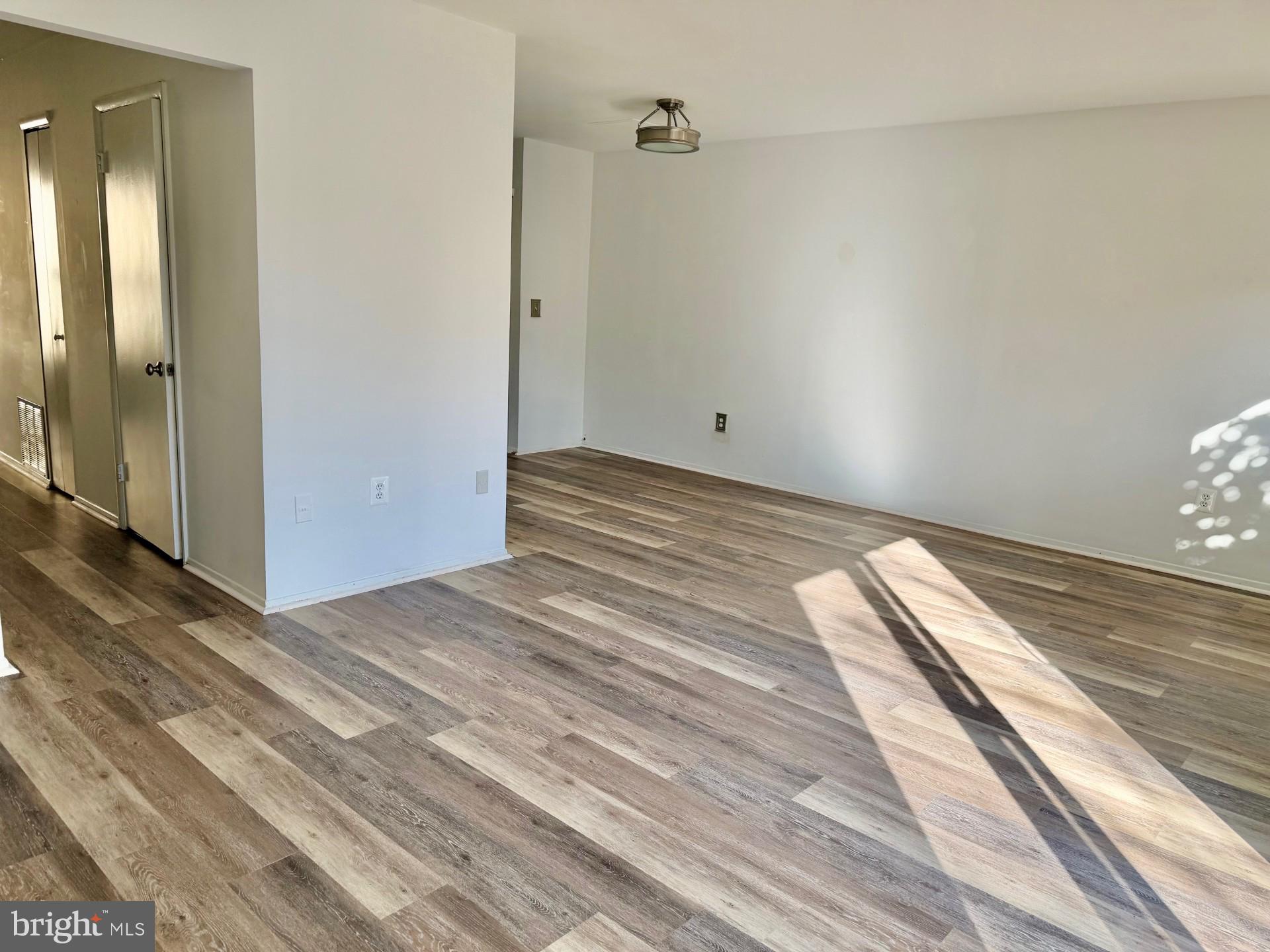 1071 Cedar Ridge Court Annapolis, MD 21403 - Photo 27 of 41 NEW FLOORING looking towards Dining and Entry Hall