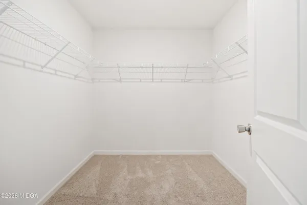 a view of a room with racks on the wall