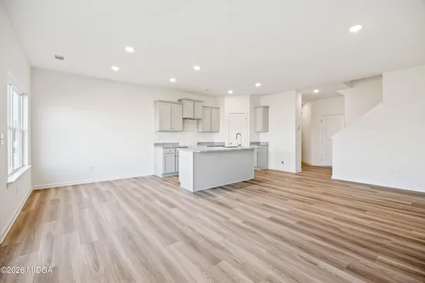 a view of kitchen with wooden floor