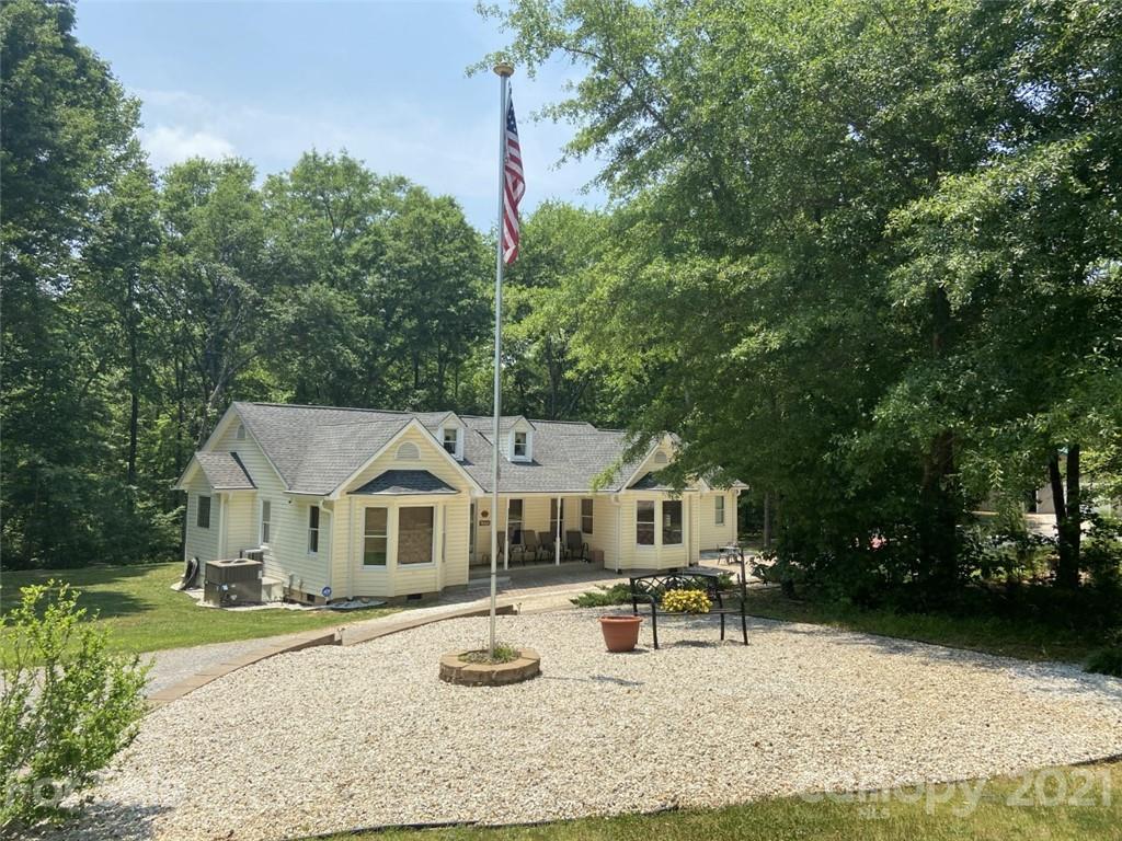 433 Foster Lake Road Blacksburg, SC 29702 - Photo 2 of 40 an aerial view of a house with swimming pool and sitting area