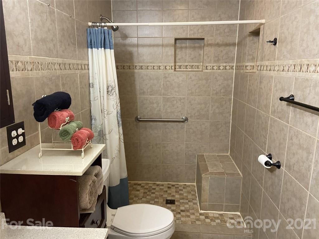 433 Foster Lake Road Blacksburg, SC 29702 - Photo 23 of 40 a bathroom with a sink toilet and shower