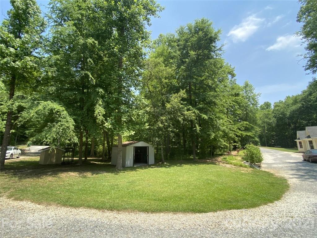 433 Foster Lake Road Blacksburg, SC 29702 - Photo 32 of 40 a view of a backyard with large trees