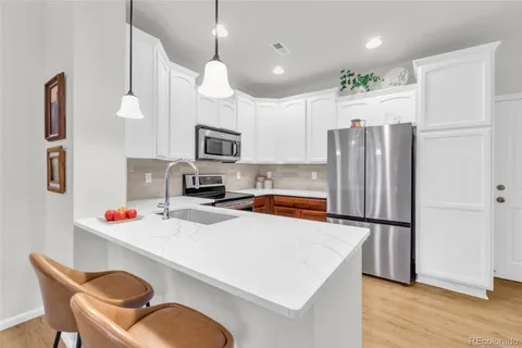 $514,000 | 15386 West 66th Drive, Unit D, Arvada, CO 80007