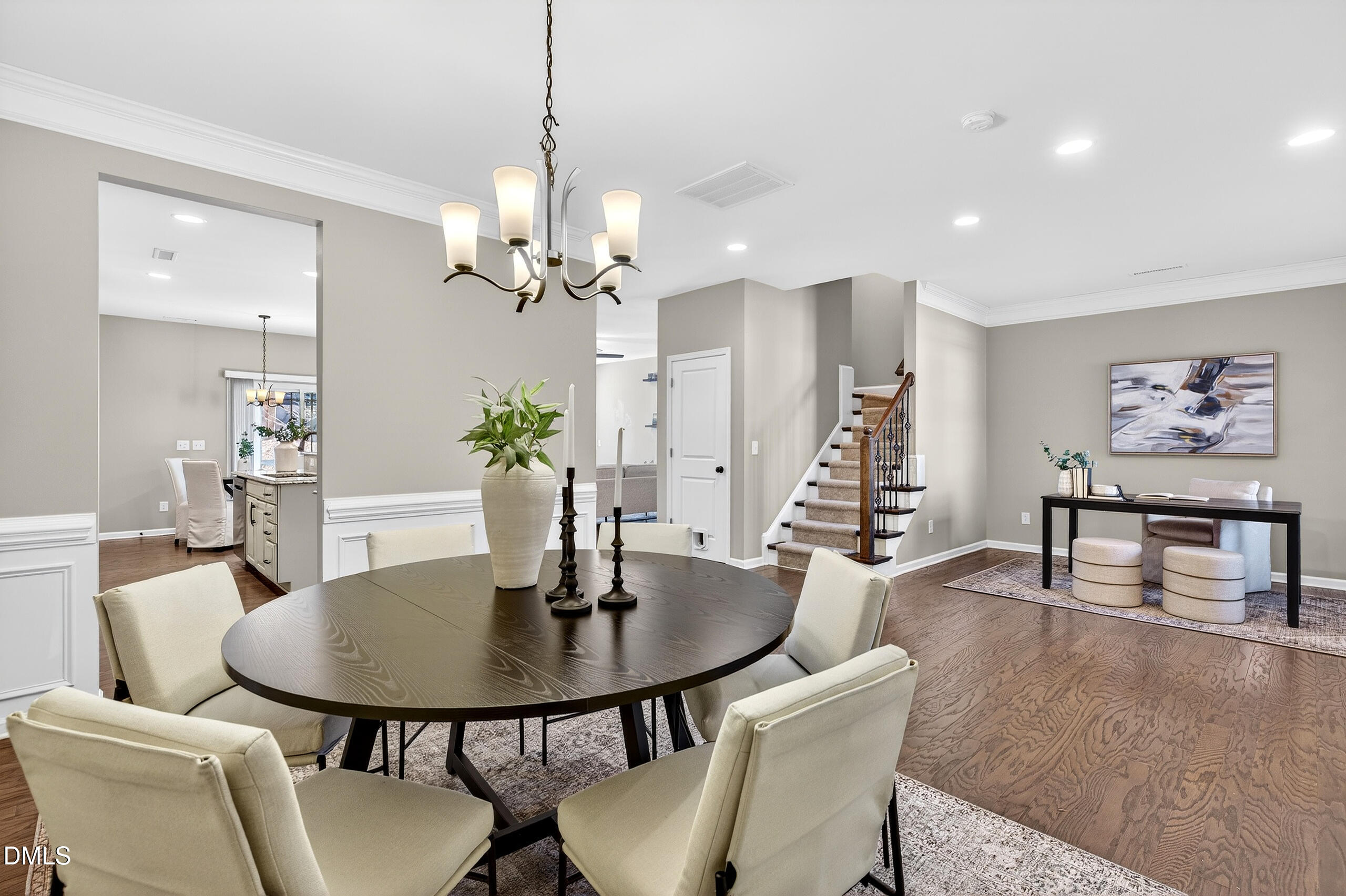 109 Willow View Lane Apex, NC 27539 - Photo 11 of 72 a view of a dining room with furniture and wooden floor