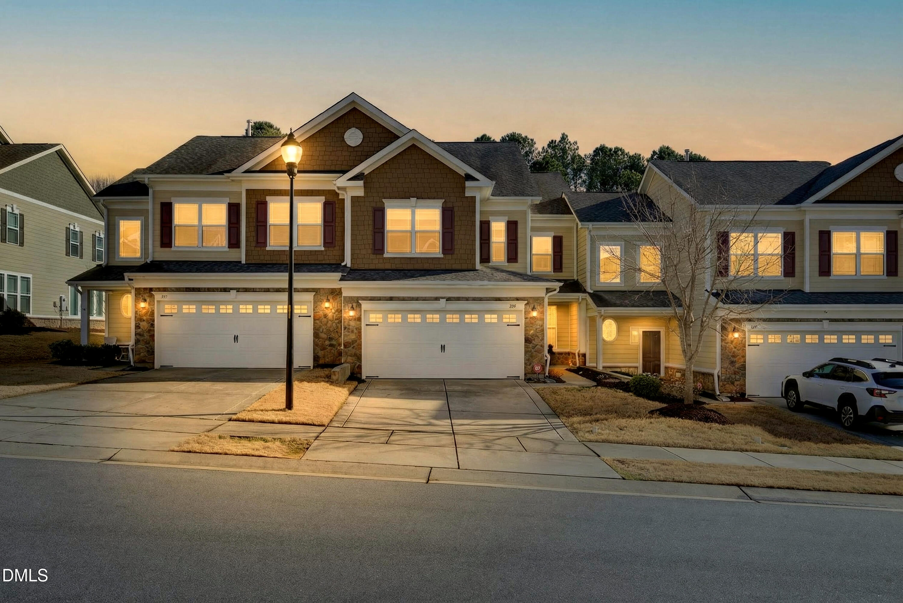 109 Willow View Lane Apex, NC 27539 - Photo 2 of 72 a front view of a house with a yard