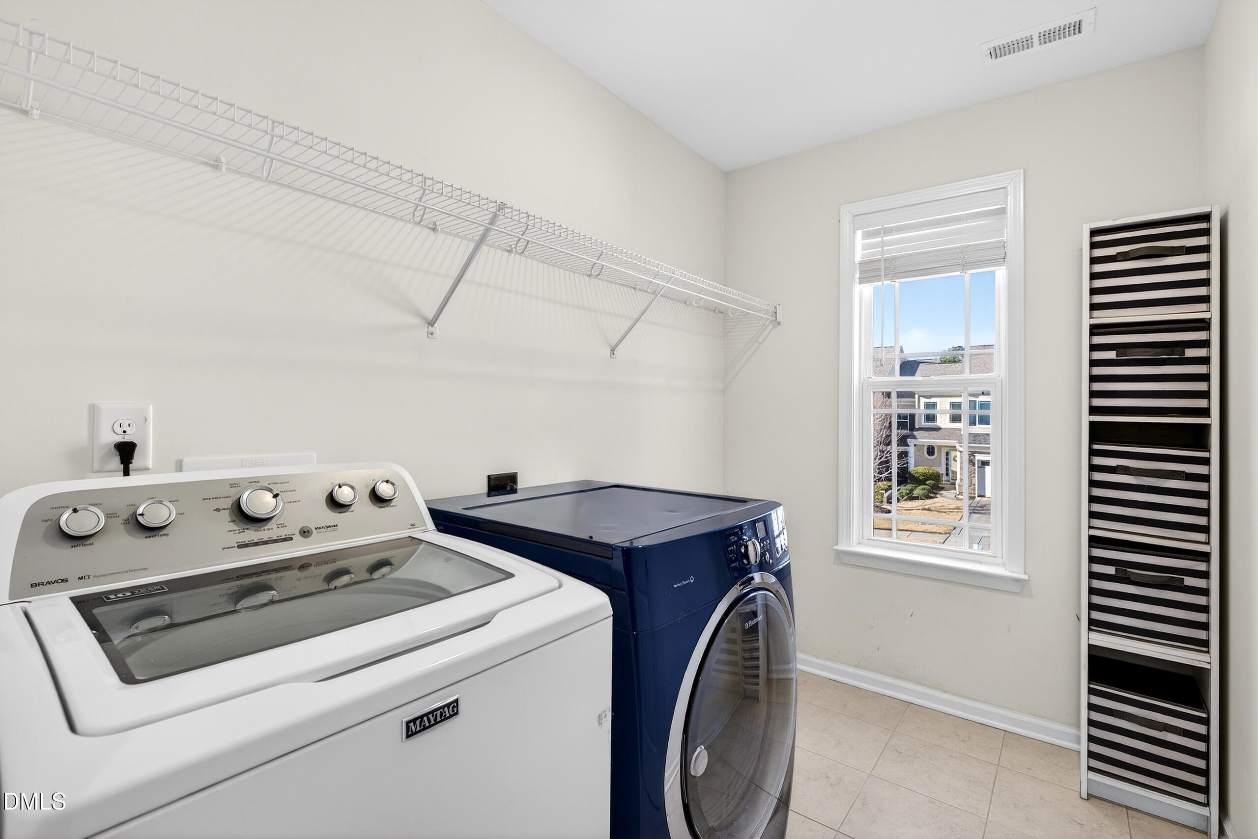 109 Willow View Lane Apex, NC 27539 - Photo 31 of 72 a utility room with dryer and washer
