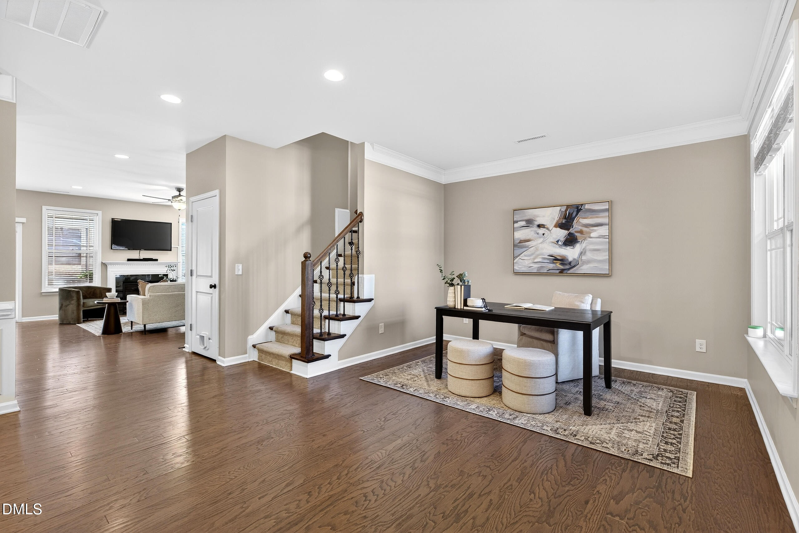 109 Willow View Lane Apex, NC 27539 - Photo 6 of 72 a dining room with furniture entryway and wooden floor